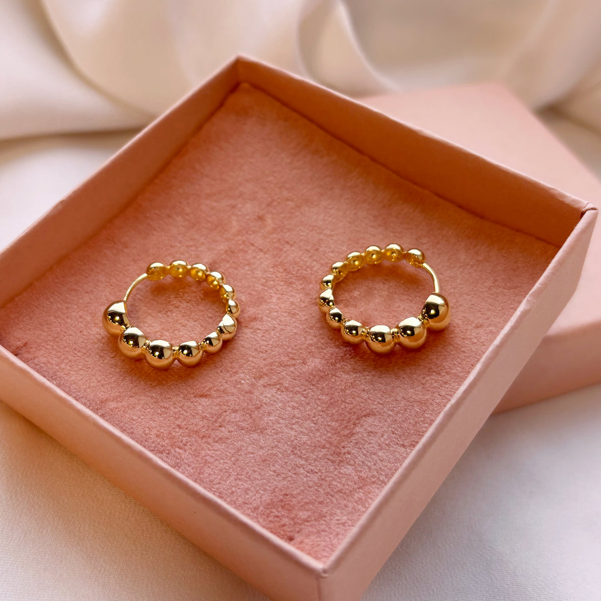 Creoler i forgyldt sølv